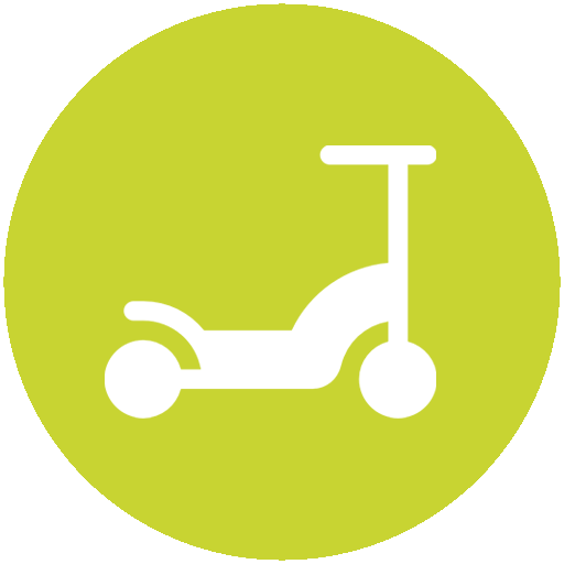 En vit kickbike på en grön bakgrund.