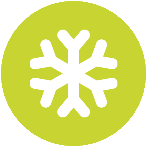 En enkel snöflinga i vitt på en grön cirkelbakgrund.